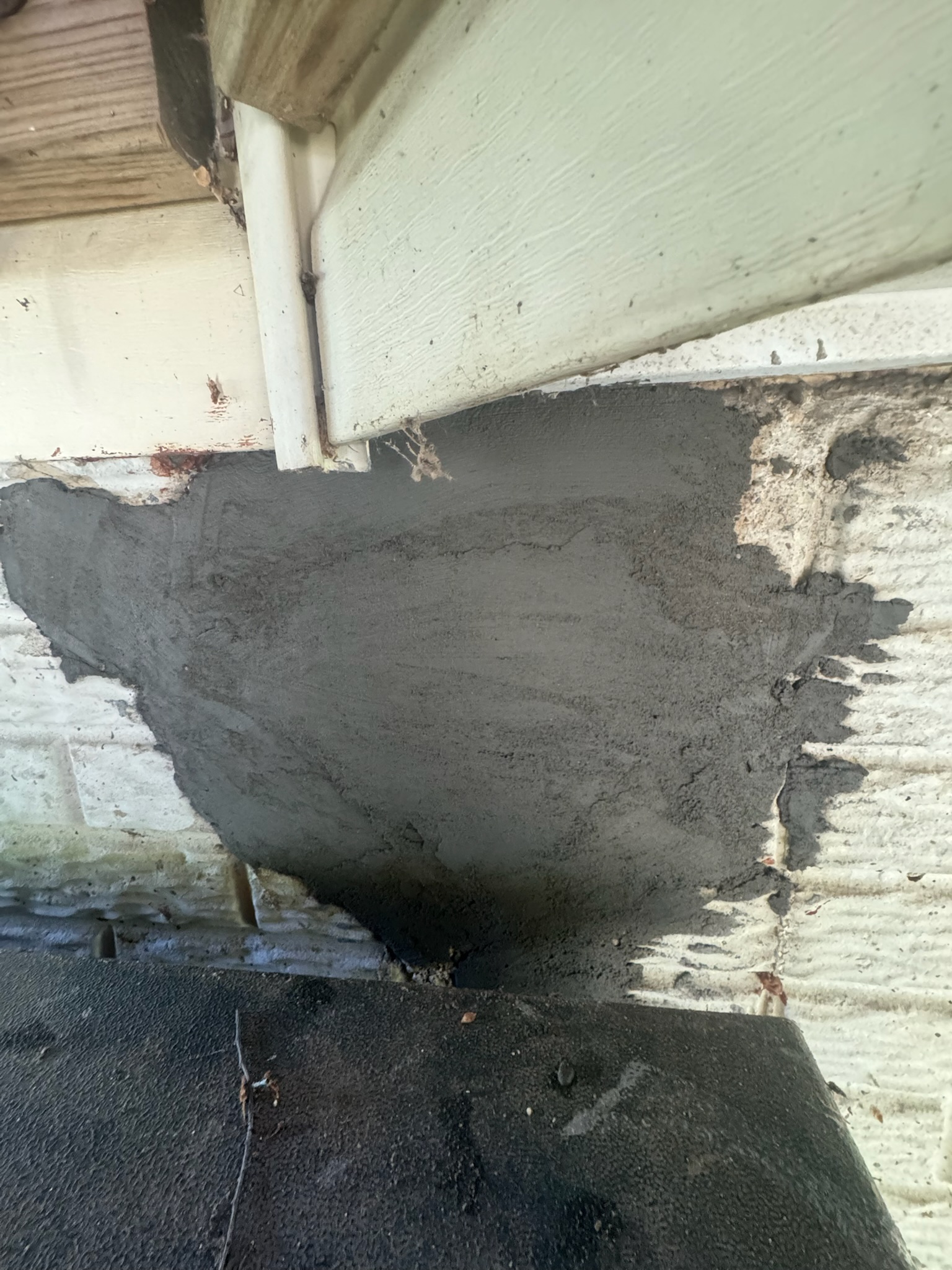 Exterior foundation crack repair and concrete patch on Maryland home