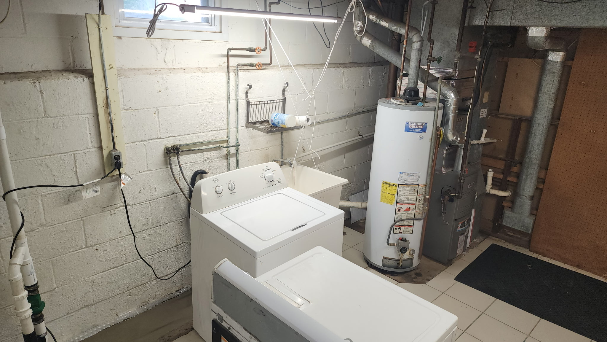 Interior drainage system installed in Maryland basement