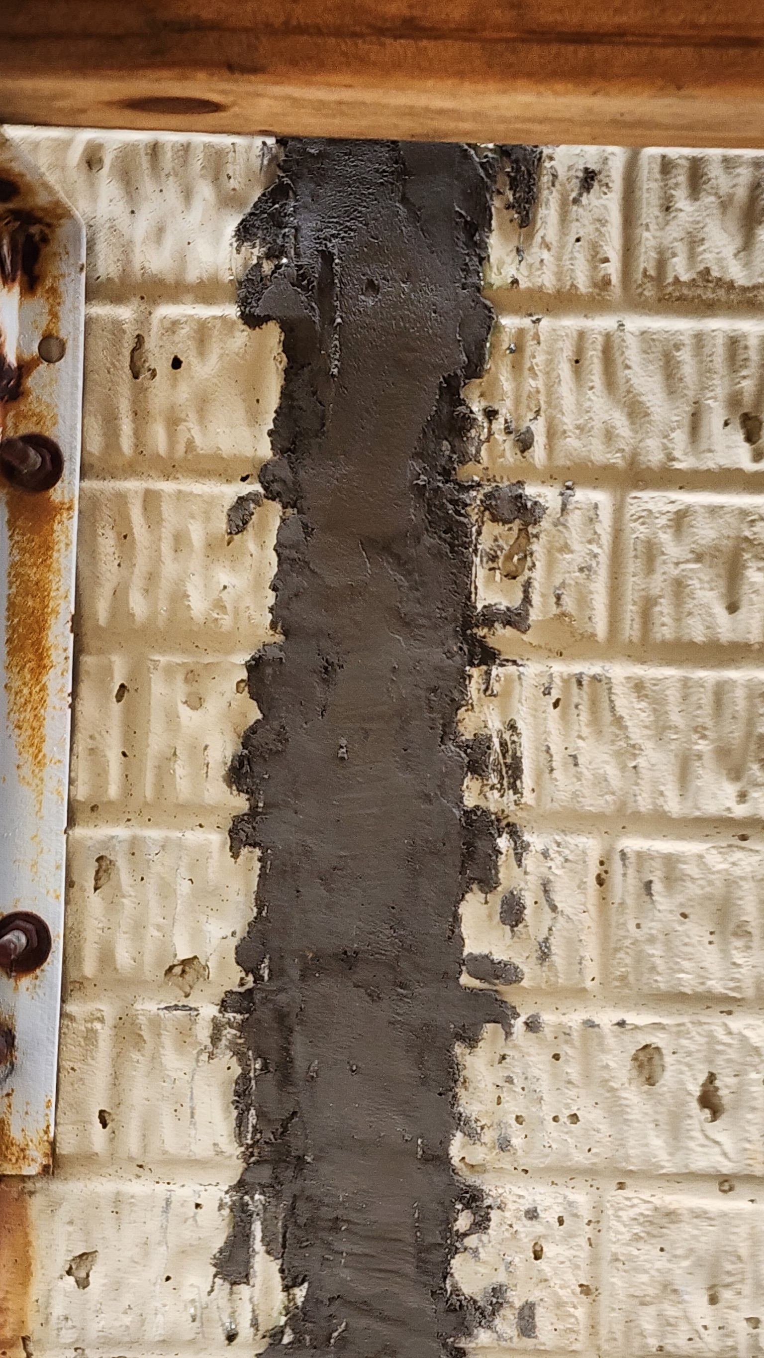 Vertical crack repair in cinder block foundation wall