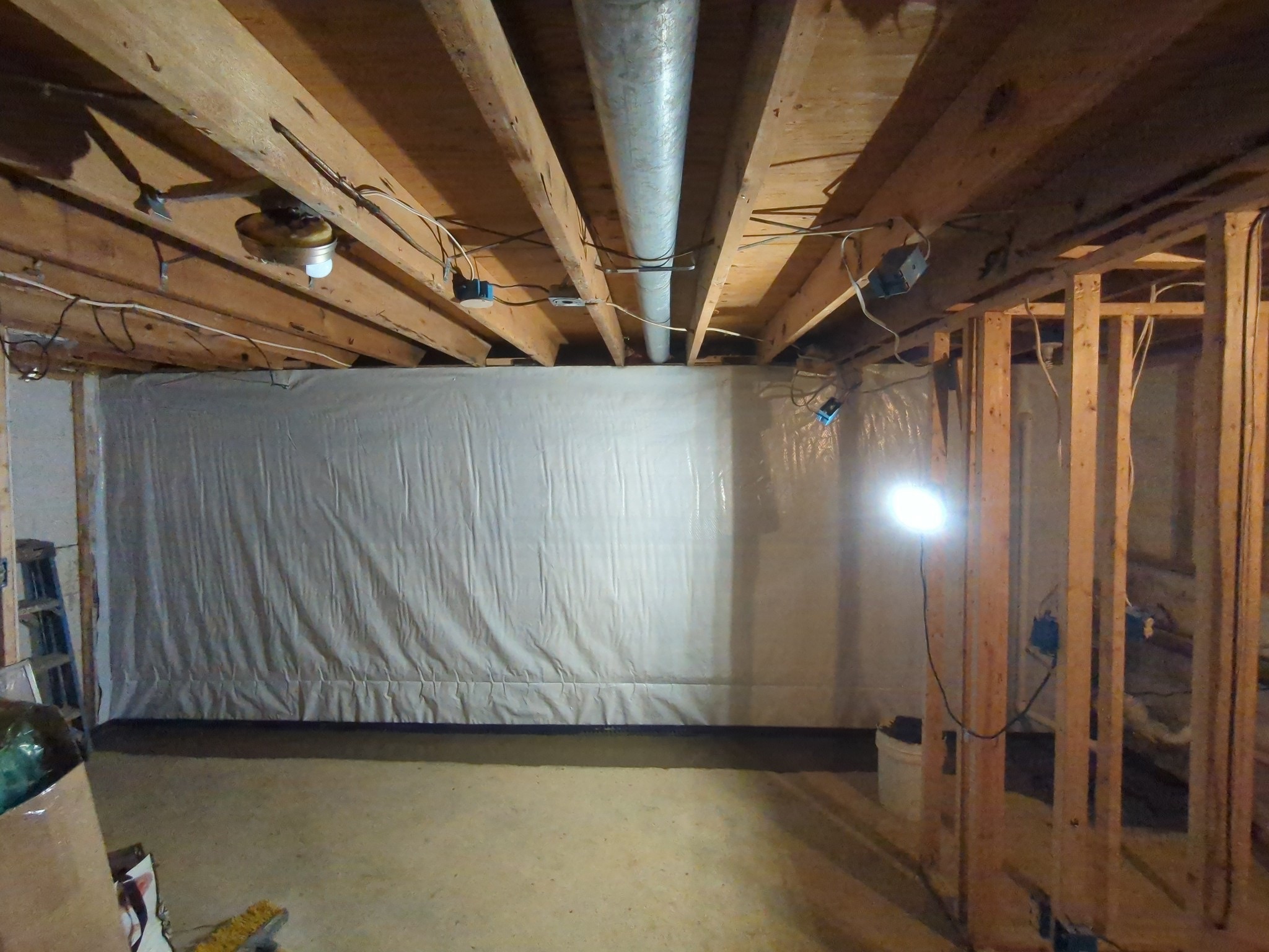 Clean encapsulated crawl space with vapor barrier and HVAC